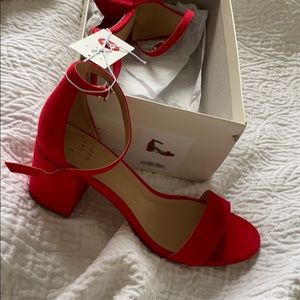 A New Day Red Pumps